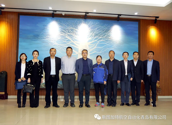 中国人民银行青岛中心支行张文武行长一行莅临乐玩考察调研